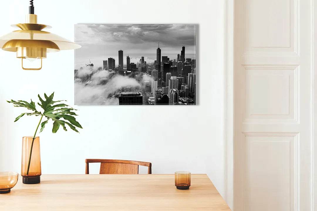Kurkborden op canvas met zwart-wit skyline boven de wolken – formaat 100 × 70 cm
