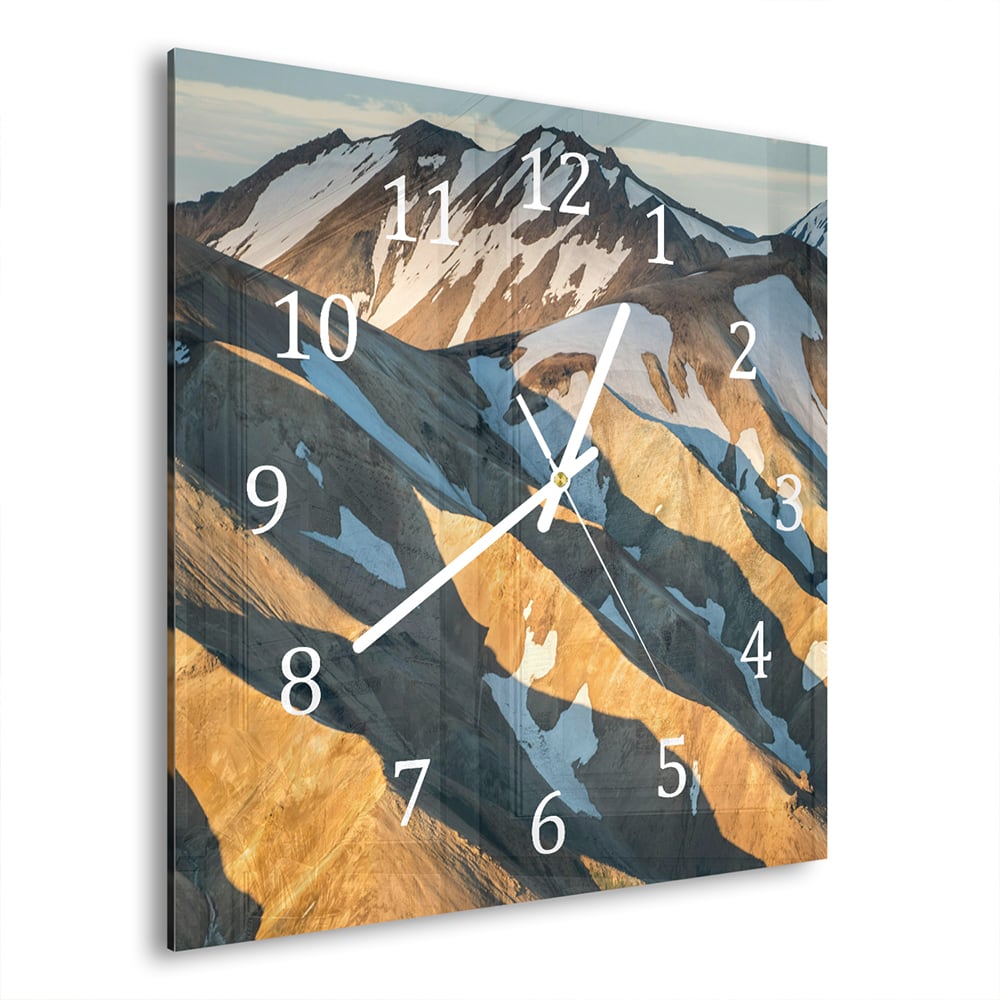 Wanduhr 30x30 - Schmelzender Schnee auf den Bergen