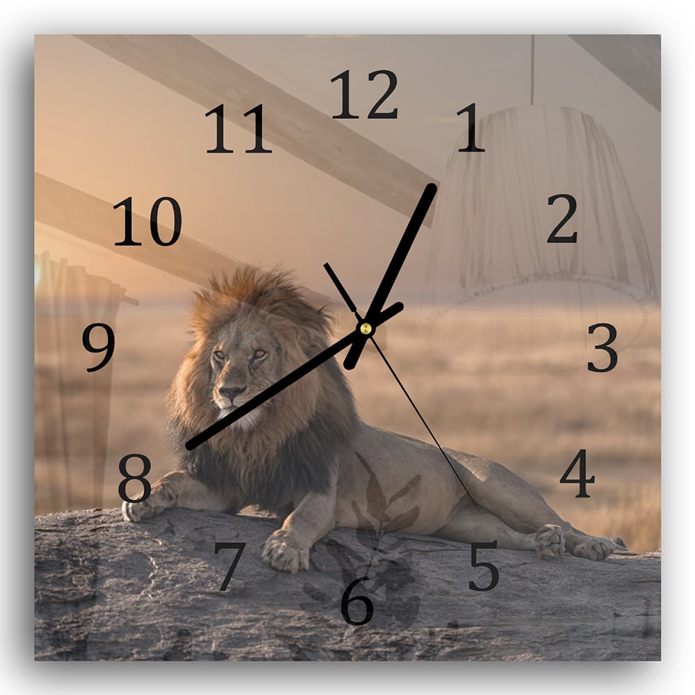Wanduhr 30x30 - Löwe auf einem Felsen