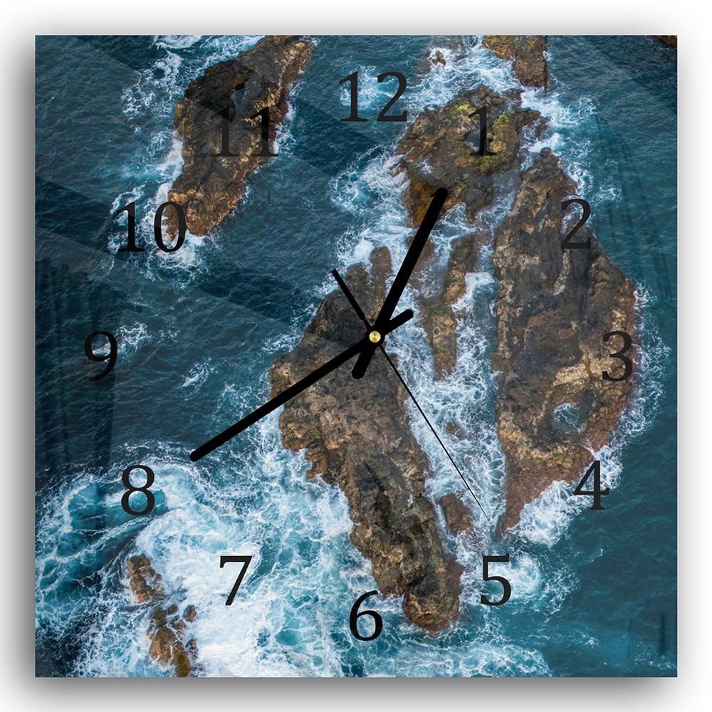 Wanduhr 30x30 - Raue See um die Felsen
