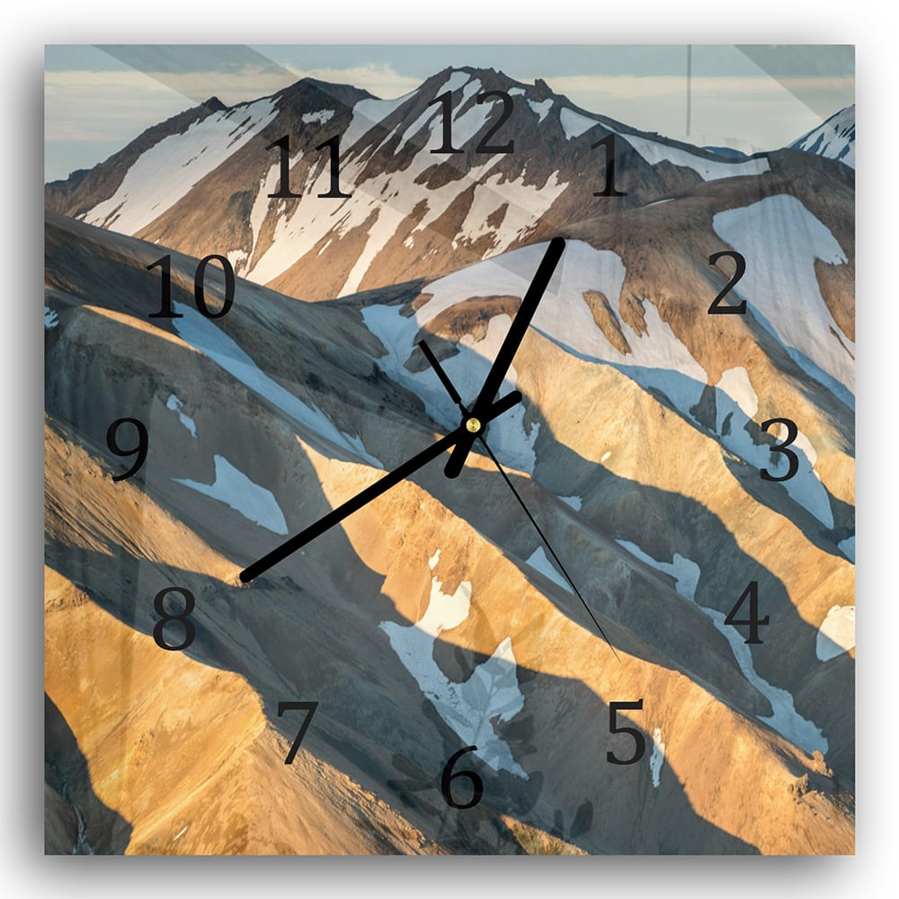 Wanduhr 30x30 - Schmelzender Schnee auf den Bergen