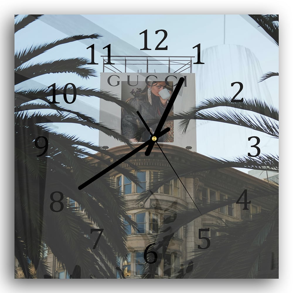 Wanduhr 30x30 - Gucci-Werbung