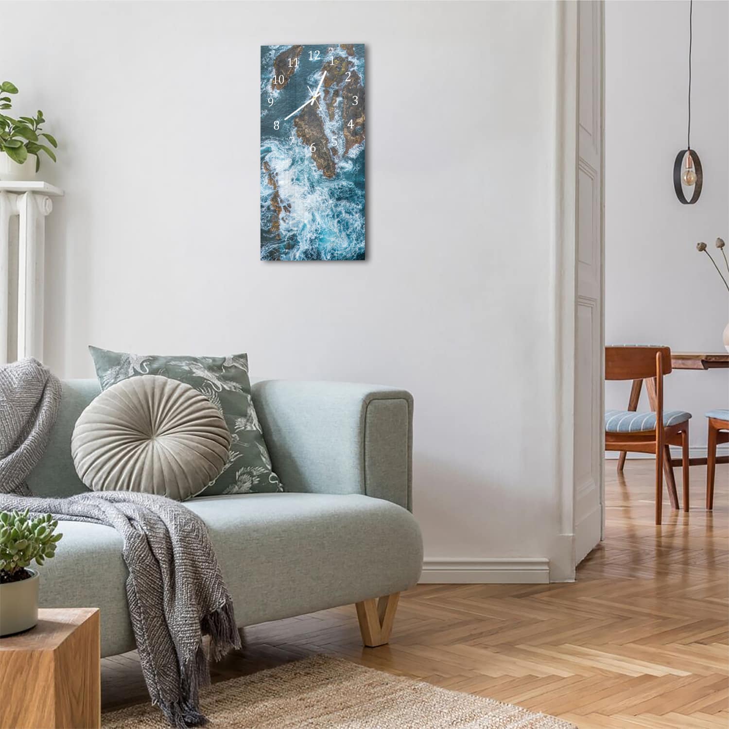 Wanduhr 30x60 - Raue See um die Felsen