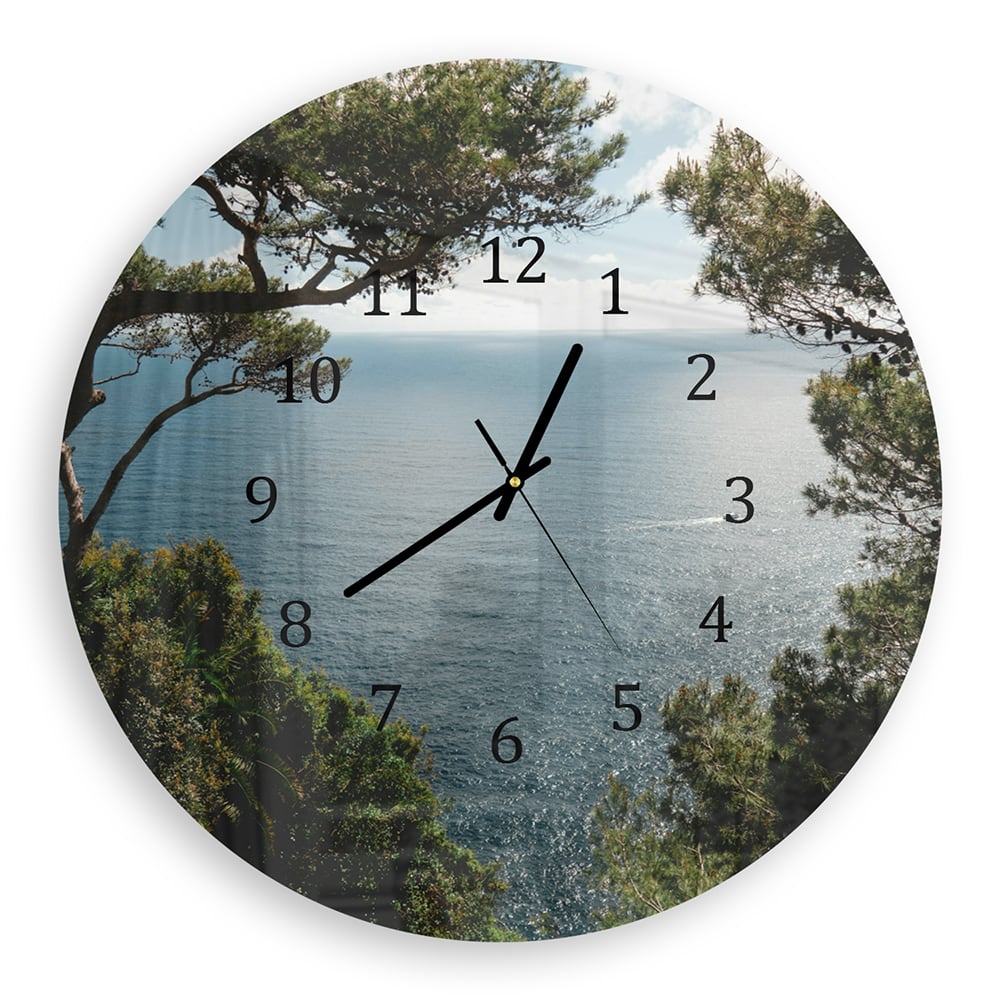 Wanduhr Rund - Meerblick durch die Bäume