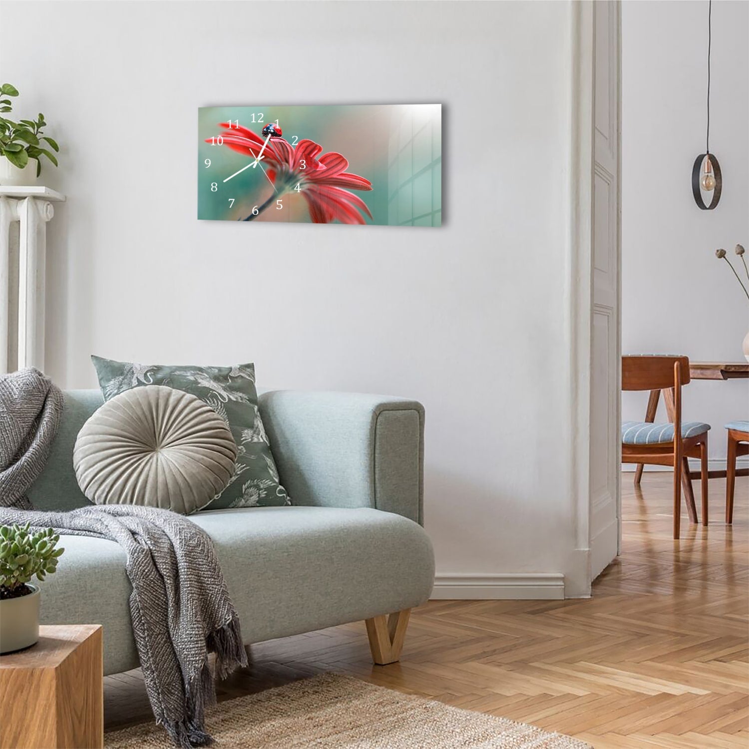 Wanduhr 60x30 - Marienkäfer auf roter Blume