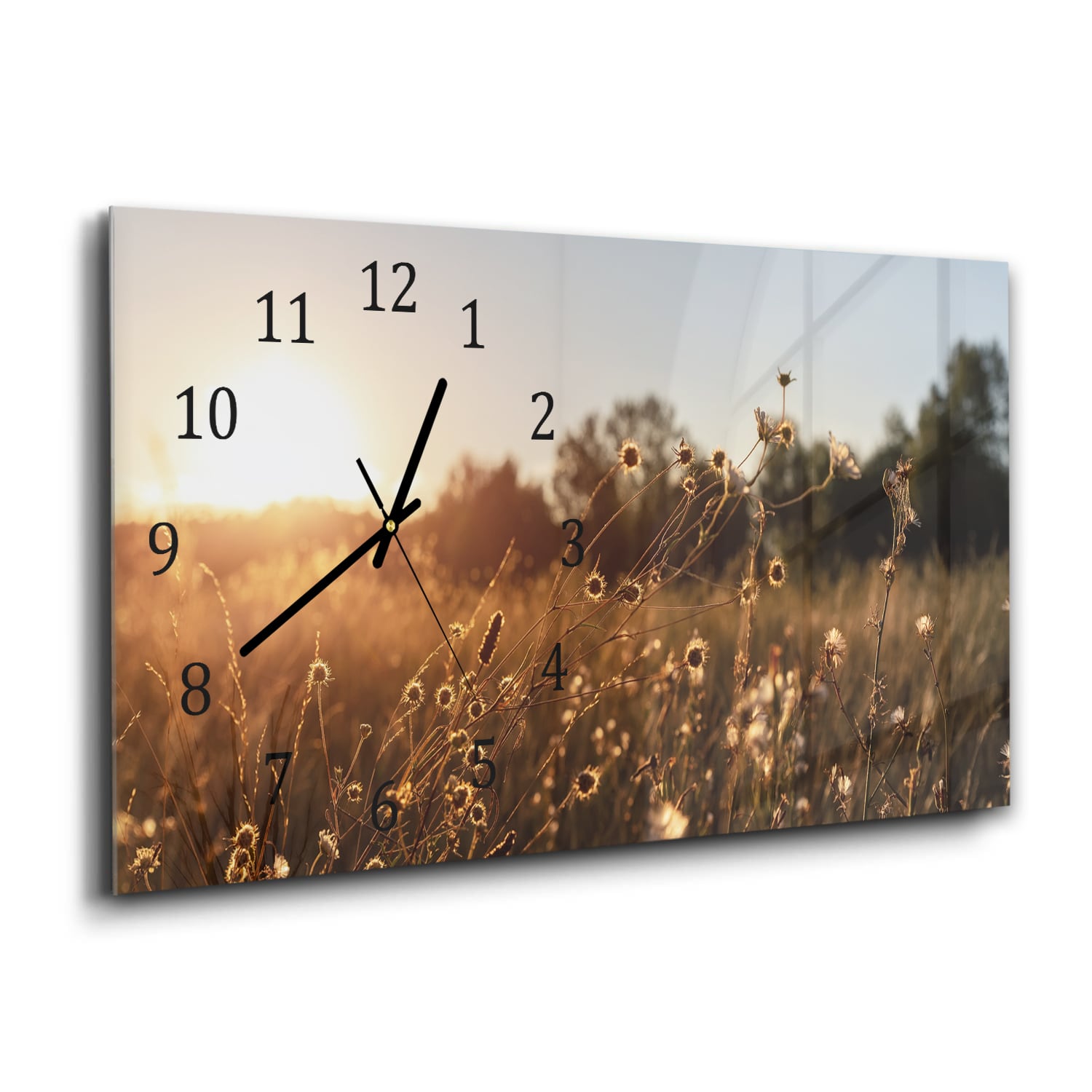 Wanduhr 60x30 - Sonnenuntergang auf der Wiese