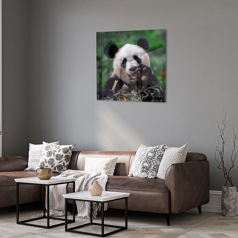 Glasbild mit einem niedlichen Panda in grüner Landschaft – Glasbild aus Sicherheitsglas, Größe 120x80