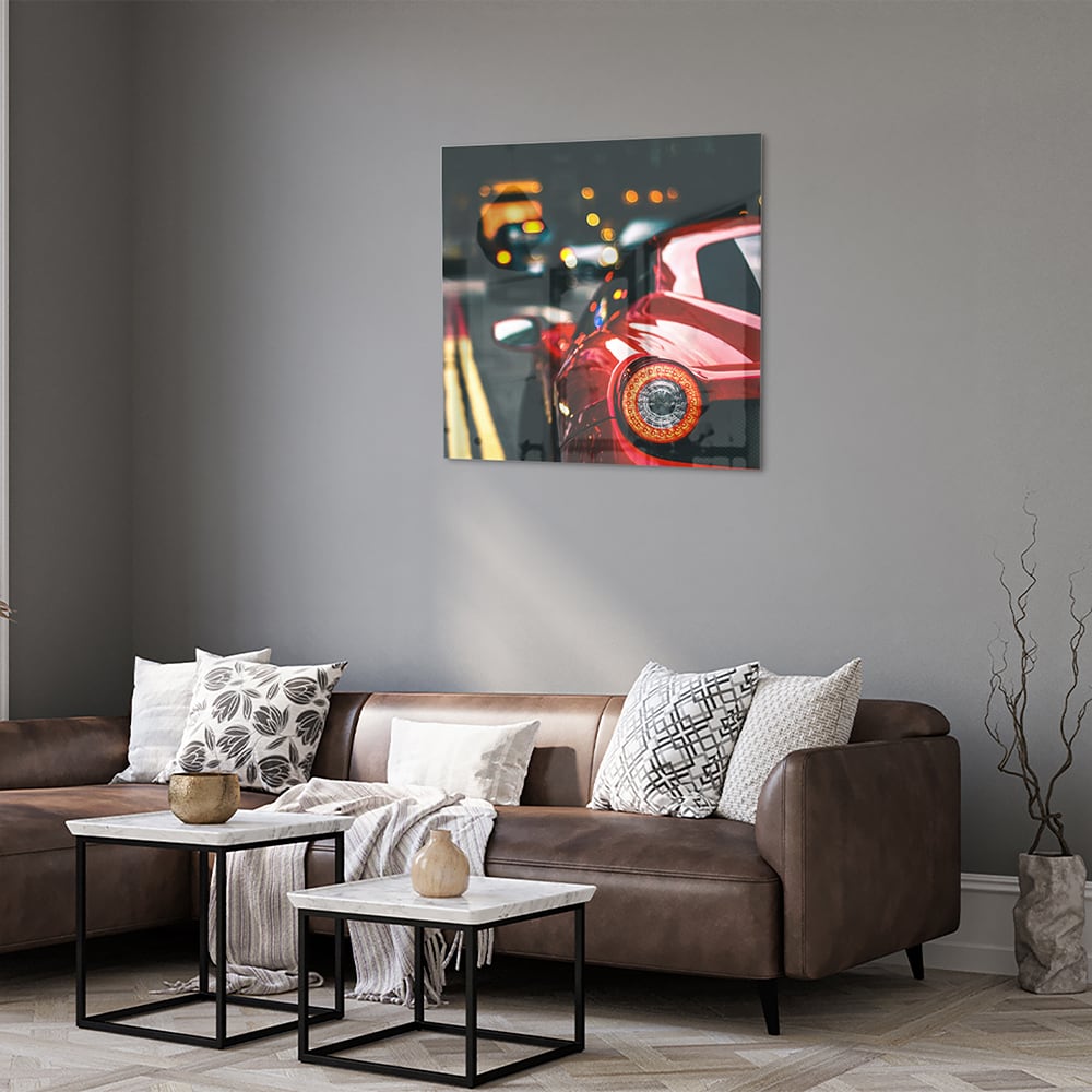 Stilvolles Glasbild mit einem roten Auto in der Stadt – Glasbild aus Sicherheitsglas, Größe 120x80