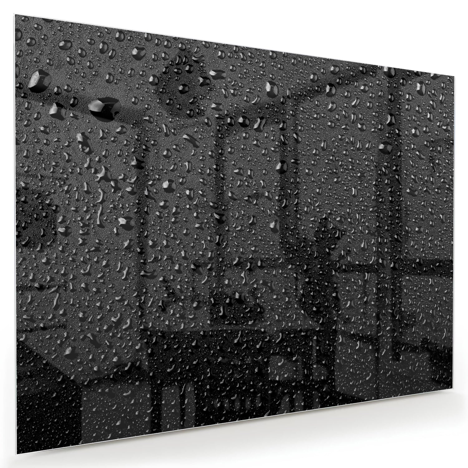 Glasbild mit Tropfen auf schwarzer Oberfläche