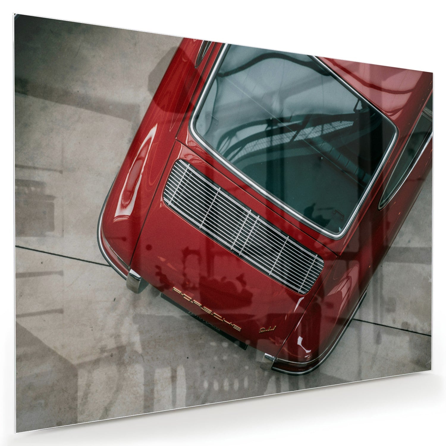 Stilvolles Glasbild mit einem roten Auto