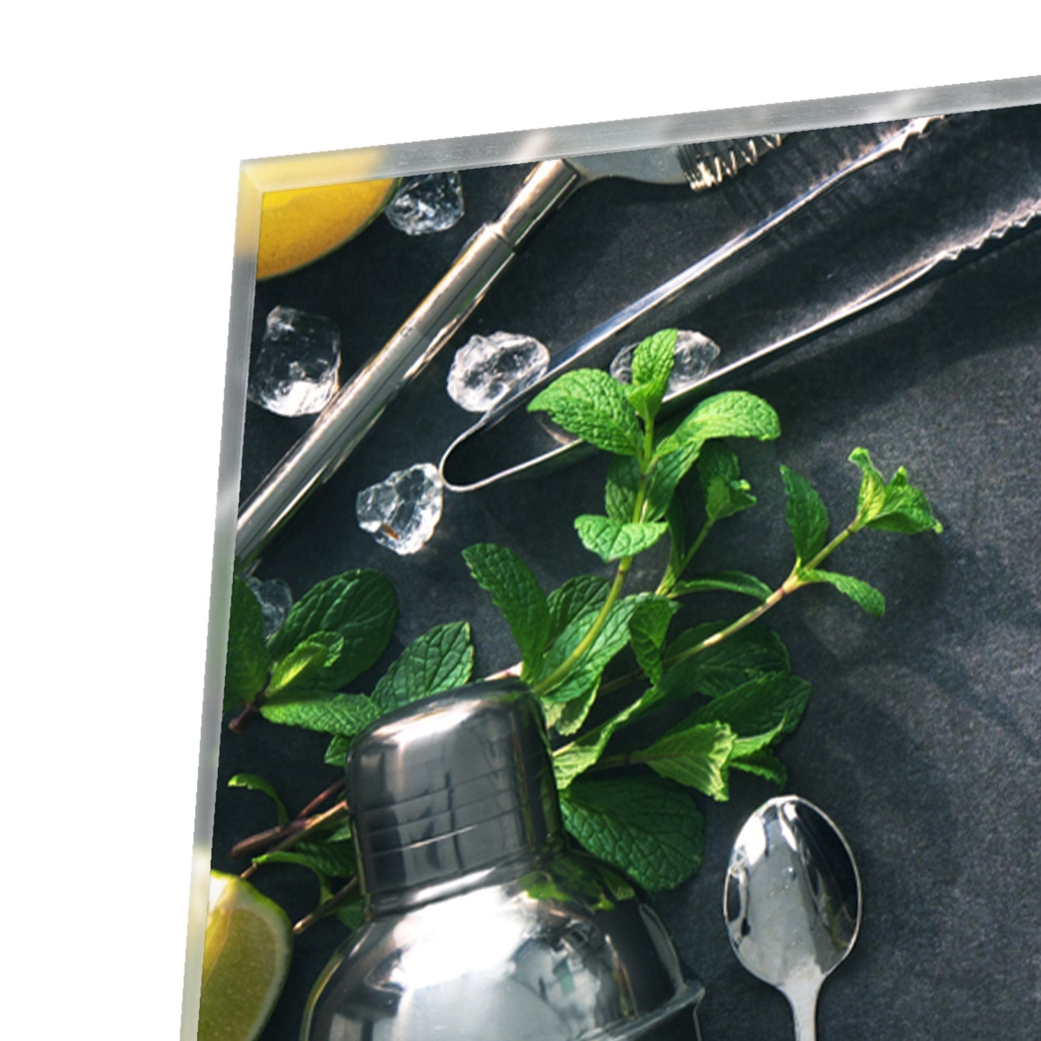 Elegantes Glasbild mit Kräutern und Zitronen