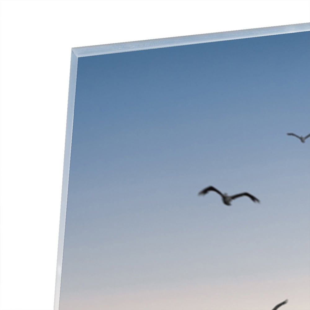 Glasbild mit ruhigem Sonnenuntergang am See