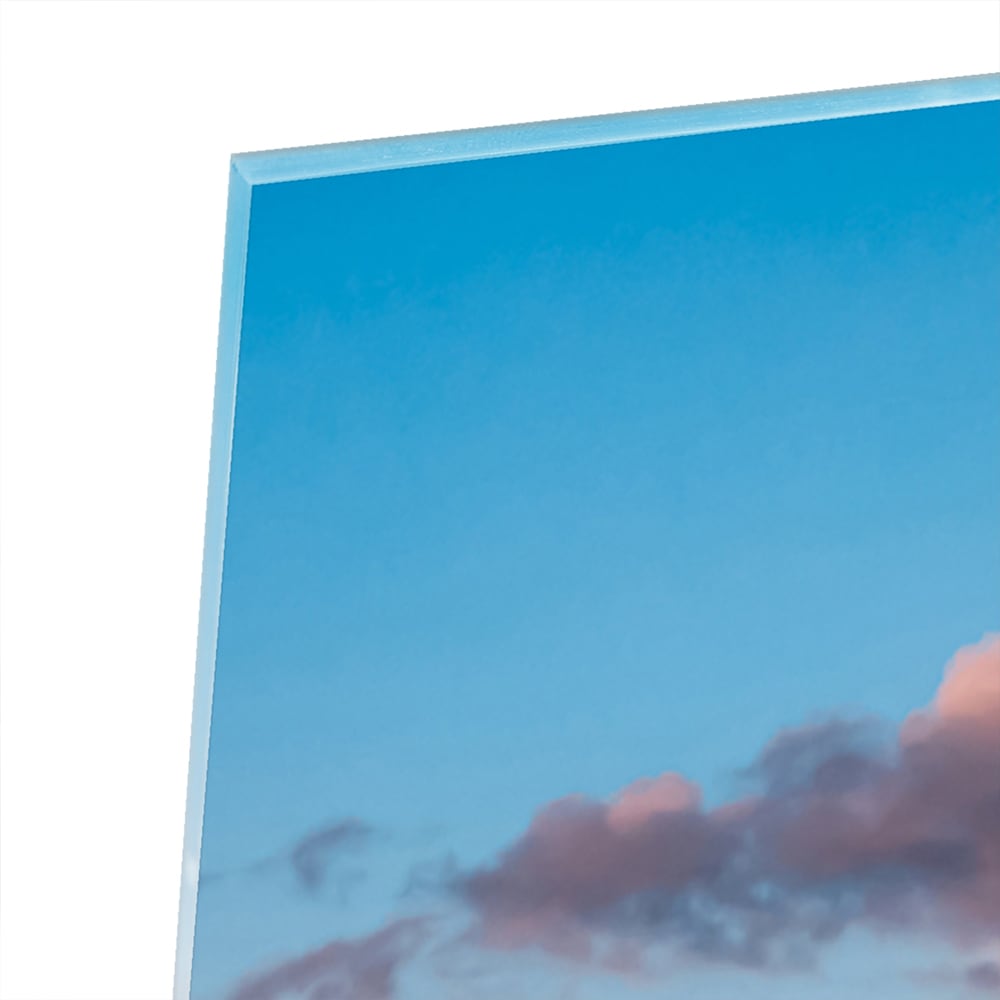 Glasbild mit Bergen bei Sonnenaufgang