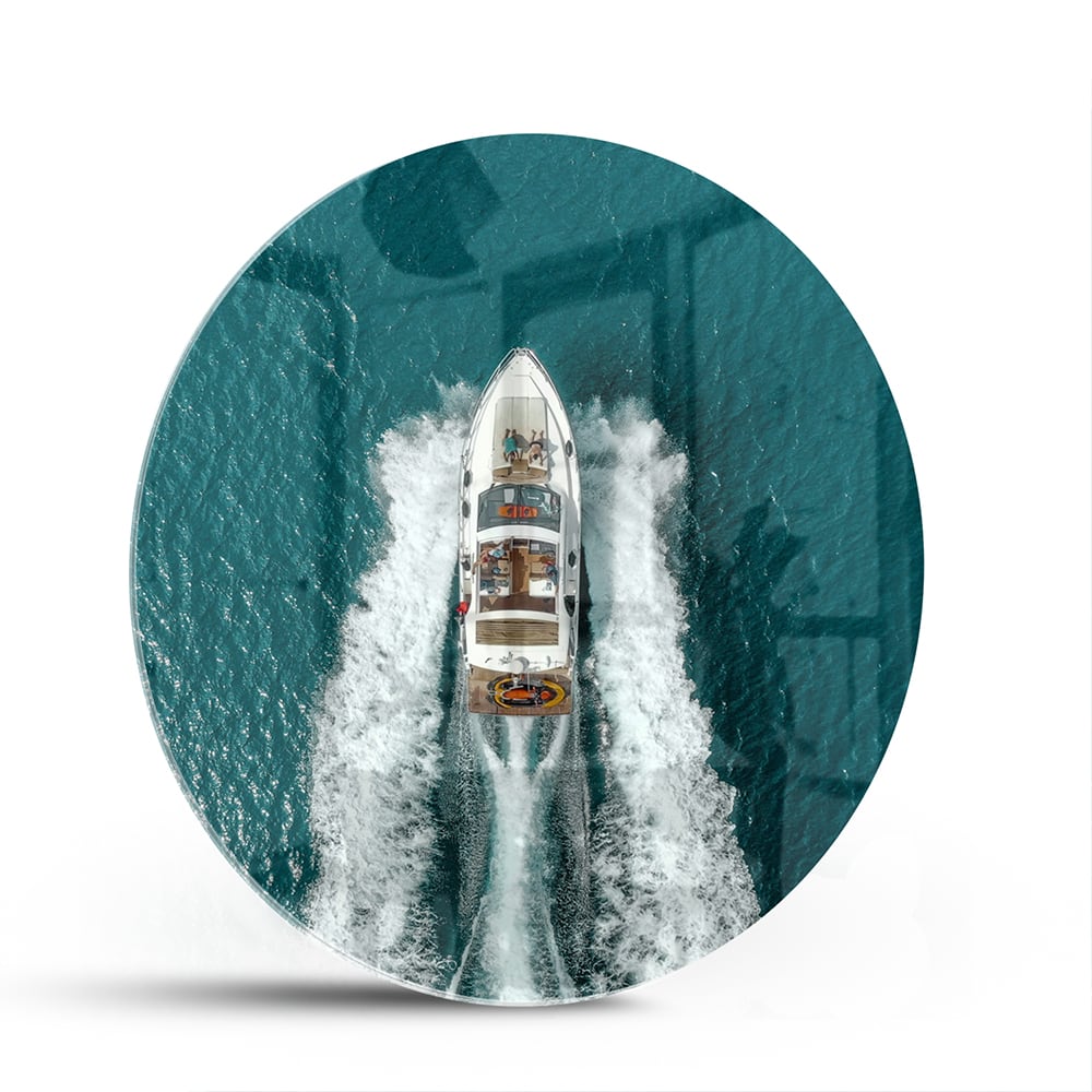 Glasbild mit einem Boot in türkisfarbenem Wasser – Glasbild aus Sicherheitsglas, Größe 140x70