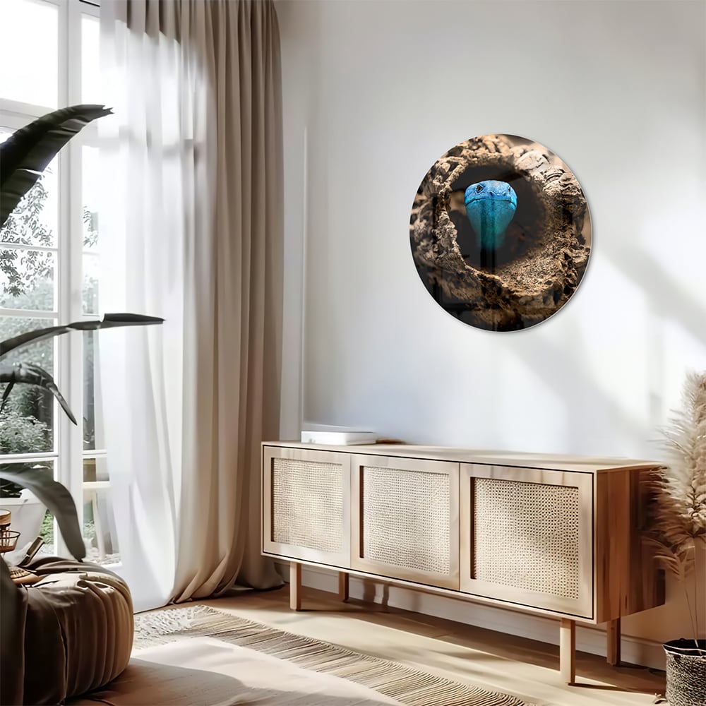 Glasbild mit einer blauen Perle in einem Nest