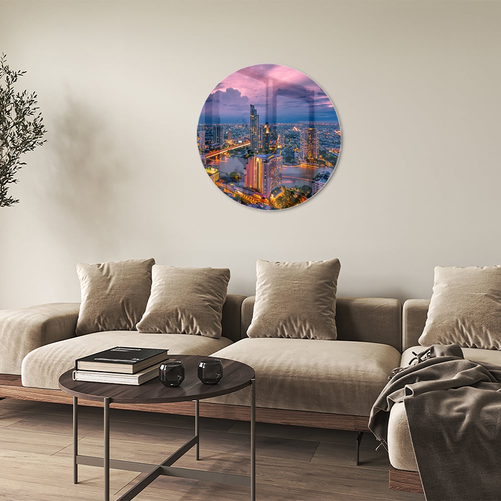 Glasbild mit Stadtblick im Abendlicht