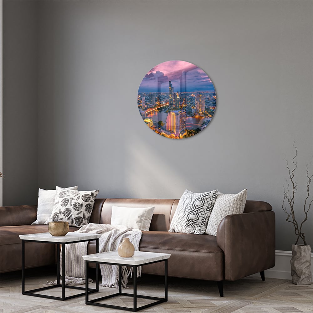 Glasbild mit Stadtblick im Abendlicht