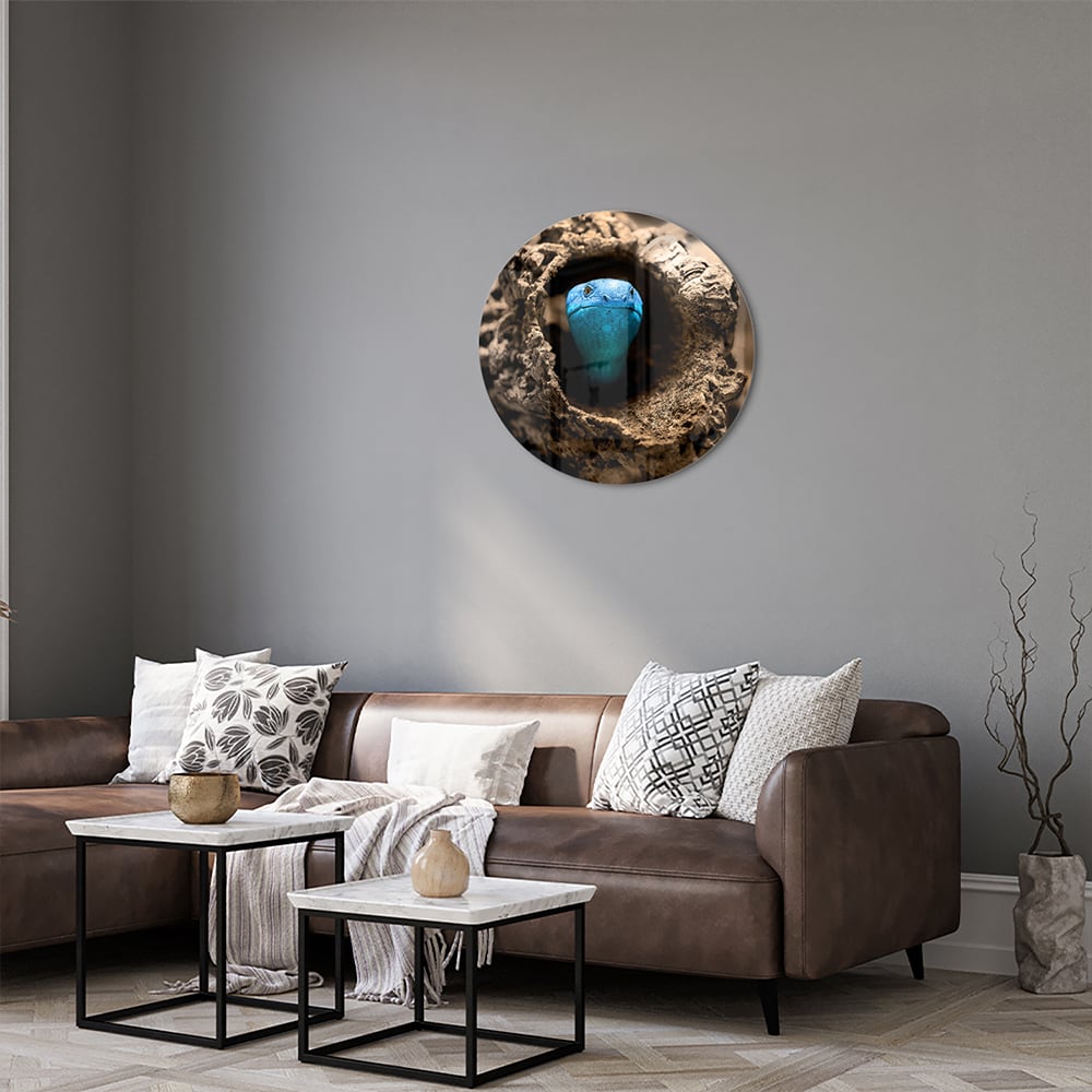 Glasbild mit einer blauen Perle in einem Nest